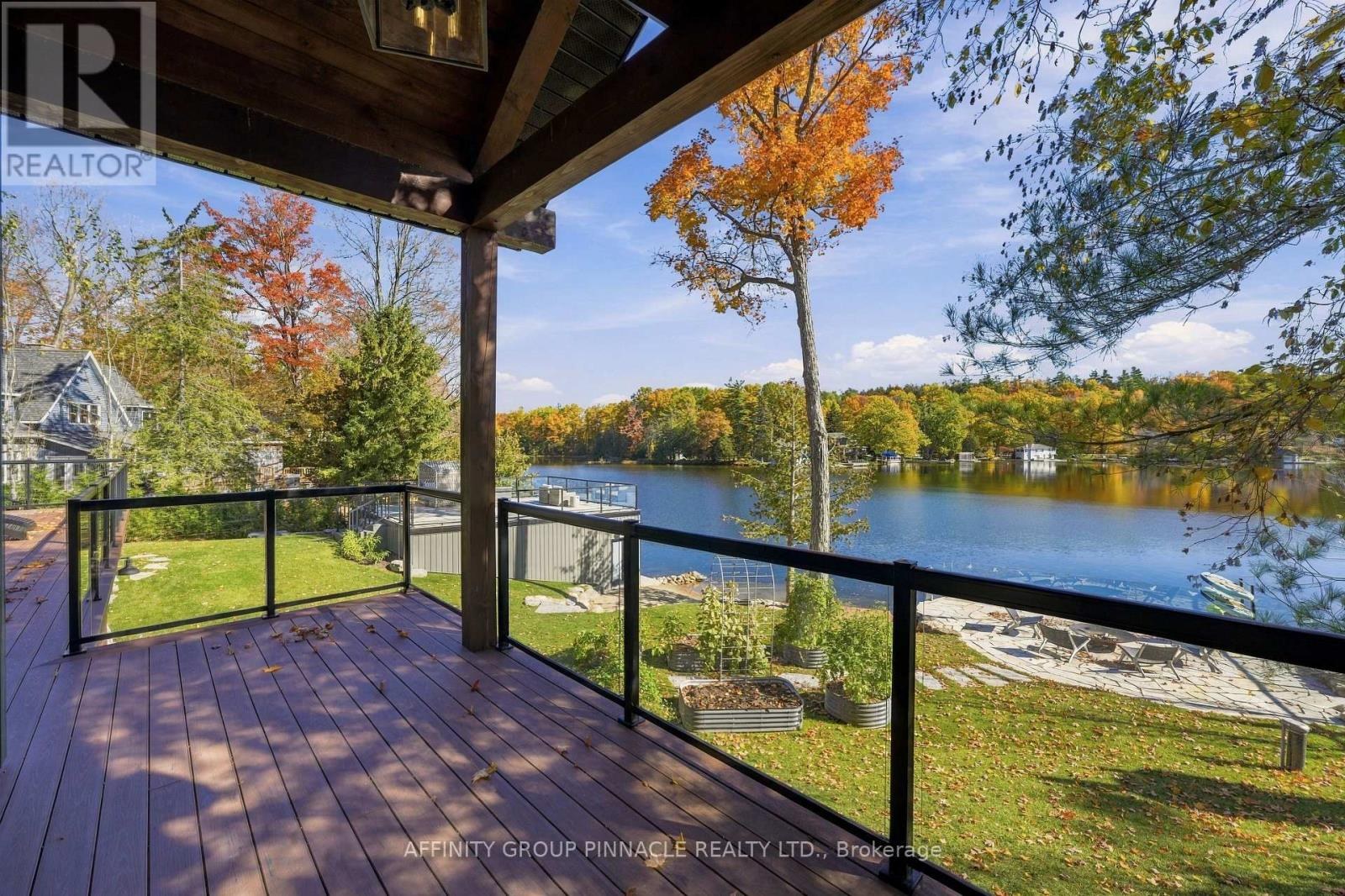 Lake views from the covered outdoor sitting area